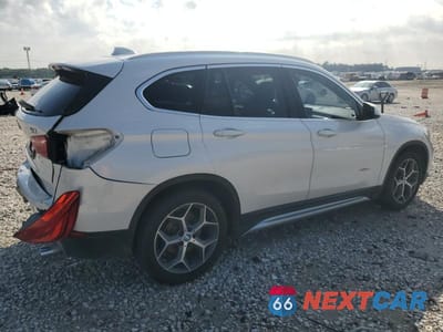 Trzecie zdjęcie samochodu z tyłu: 2018 BMW X1 XDRIVE28I VIN:WBXHT3C39J5K25431 - miniatura