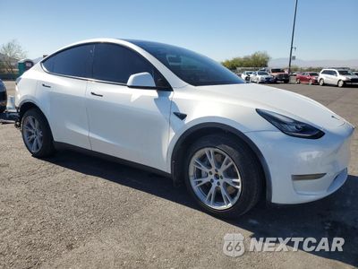 Czwarte zdjęcie samochodu z boku: 2022 TESLA MODEL Y VIN:7SAYGDEE6NA014374 - miniatura