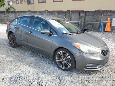 Czwarte zdjęcie samochodu z boku: 2014 KIA FORTE VIN:KNAFZ4A86E5050629 - miniatura