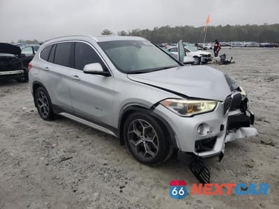 Czwarte zdjęcie samochodu z boku: 2016 BMW X1 XDRIVE28I VIN:WBXHT3C36GP880899 - miniatura