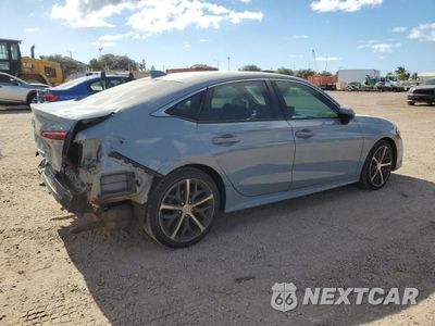 Trzecie zdjęcie samochodu z tyłu: 2023 HONDA CIVIC TOURING VIN:2HGFE1F98PH311318 - miniatura