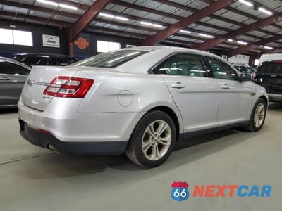 Trzecie zdjęcie samochodu z tyłu: 2016 FORD TAURUS SE VIN:1FAHP2D82GG102742 - miniatura