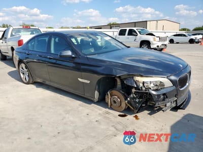 Czwarte zdjęcie samochodu z boku: 2010 BMW 750 I VIN:WBAKA8C50ACY35931 - miniatura