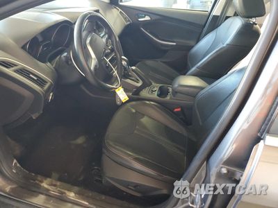 Zdjęcie 7 z 13 samochodu: 2014 FORD FOCUS TITANIUM VIN:1FADP3N23EL286057 - miniatura