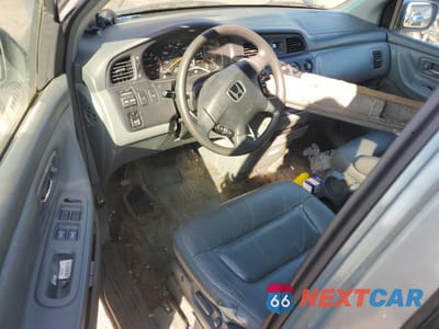 Zdjęcie 8 z 12 samochodu: 2002 HONDA ODYSSEY EXL VIN:5FNRL18962B041065 - miniatura