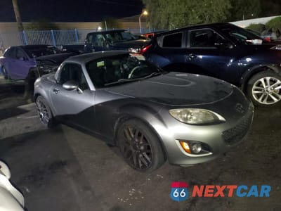 Czwarte zdjęcie samochodu z boku: 2011 MAZDA MX-5 MIATA VIN:JM1NC2PF6B0214559 - miniatura