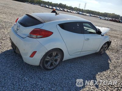 Trzecie zdjęcie samochodu z tyłu: 2013 HYUNDAI VELOSTER VIN:KMHTC6AD4DU104557 - miniatura