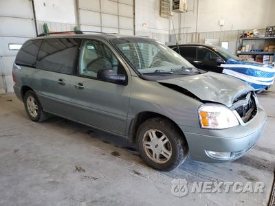 Czwarte zdjęcie samochodu z boku: 2007 FORD FREESTAR SEL VIN:2FMZA522X7BA15383 - miniatura