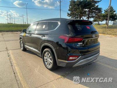 Trzecie zdjęcie samochodu z tyłu: 2019 HYUNDAI SANTA FE SEL VIN:5NMS33AD3KH021706 - miniatura