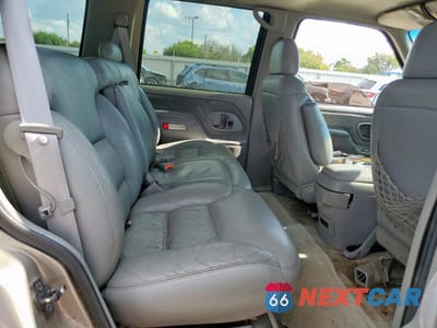Zdjęcie 10 z 14 samochodu: 1999 CHEVROLET TAHOE VIN:1GNEK13R5XR149467 - miniatura