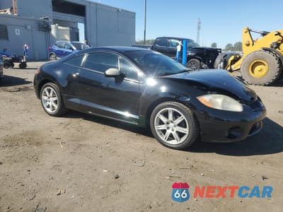 Czwarte zdjęcie samochodu z boku: 2007 MITSUBISHI ECLIPSE ES VIN:4A3AK64F17E072755 - miniatura