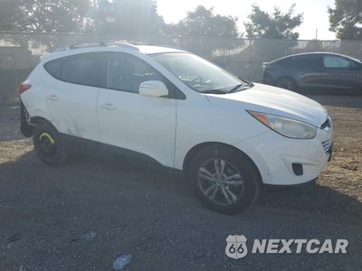 Czwarte zdjęcie samochodu z boku: 2012 HYUNDAI TUCSON GLS VIN:KM8JU3AC4CU485335 - miniatura