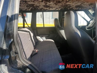 Zdjęcie 10 z 12 samochodu: 1999 JEEP CHEROKEE SE VIN:1J4FT28P3XL595475 - miniatura