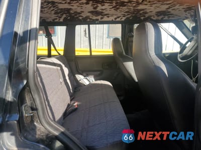 Zdjęcie 10 z 14 samochodu: 1999 JEEP CHEROKEE SE VIN:1J4FT28P3XL595475 - miniatura
