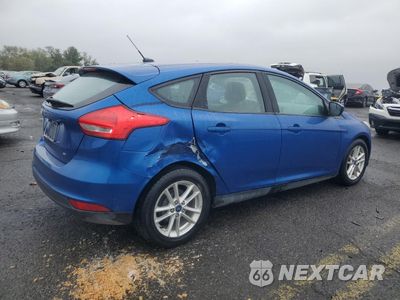Trzecie zdjęcie samochodu z tyłu: 2018 FORD FOCUS SE VIN:1FADP3K29JL318704 - miniatura