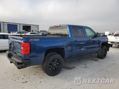 Trzecie zdjęcie samochodu z tyłu: 2017 CHEVROLET SILVERADO K1500 LT VIN:3GCUKREC0HG235850 - miniatura