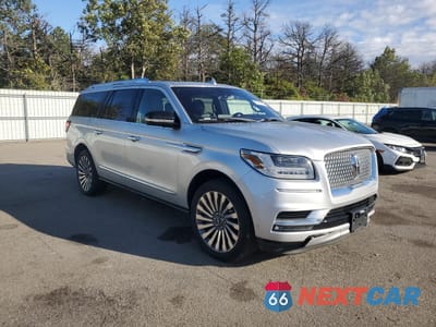 Czwarte zdjęcie samochodu z boku: 2018 LINCOLN NAVIGATOR L RESERVE VIN:5LMJJ3LT9JEL05566 - miniatura