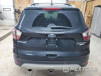 Zdjęcie 6 z 12 samochodu: 2017 FORD ESCAPE TITANIUM VIN:1FMCU9J99HUD26575 - miniatura