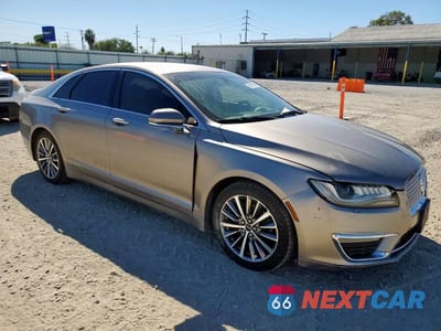 Czwarte zdjęcie samochodu z boku: 2019 LINCOLN MKZ VIN:3LN6L5KU5KR619321 - miniatura