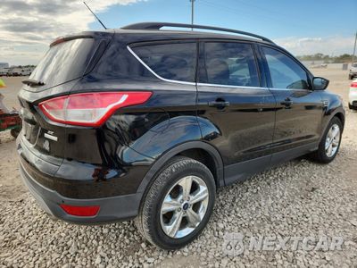 Trzecie zdjęcie samochodu z tyłu: 2016 FORD ESCAPE SE VIN:1FMCU0GX4GUC25606 - miniatura