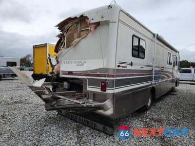 Czwarte zdjęcie samochodu z boku: 1997 HOLIDAY RAMBLER ENDEAVOR RECREATIONAL VEHICLE VIN:4UZ6XJBC4TC757971 - miniatura
