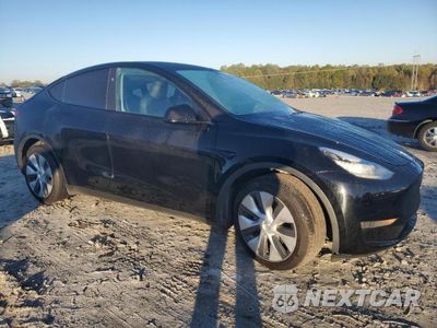 Czwarte zdjęcie samochodu z boku: 2023 TESLA MODEL Y VIN:7SAYGDEE9PA144264 - miniatura