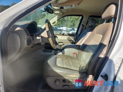 Zdjęcie 7 z 13 samochodu: 2003 FORD EXPLORER EDDIE BAUER VIN:1FMZU74K23UA11963 - miniatura