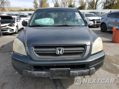 Piąte zdjęcie samochodu w środku: 2003 HONDA PILOT LX VIN:2HKYF18173H584893 - miniatura