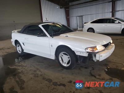 Czwarte zdjęcie samochodu z boku: 1996 FORD MUSTANG VIN:1FALP4443TF233780 - miniatura