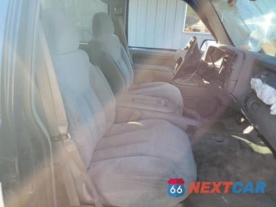Zdjęcie 7 z 14 samochodu: 1999 CHEVROLET TAHOE K1500 VIN:1GNEK13R1XJ511163 - miniatura