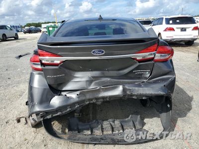 Zdjęcie 6 z 12 samochodu: 2017 FORD FUSION TITANIUM HEV VIN:3FA6P0RU6HR236665 - miniatura