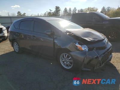 Czwarte zdjęcie samochodu z boku: 2015 TOYOTA PRIUS V VIN:JTDZN3EU4FJ020180 - miniatura