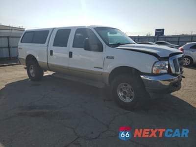 Czwarte zdjęcie samochodu z boku: 2001 FORD F250 SUPER DUTY VIN:1FTNW21FX1EB40306 - miniatura