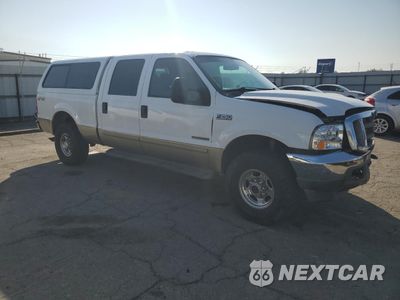 Czwarte zdjęcie samochodu z boku: 2001 FORD F250 SUPER DUTY VIN:1FTNW21FX1EB40306 - miniatura
