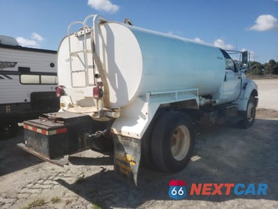 Trzecie zdjęcie samochodu z tyłu: 2015 FORD F750 WATER TRUCK VIN:3FRXF7FA8FV718274 - miniatura