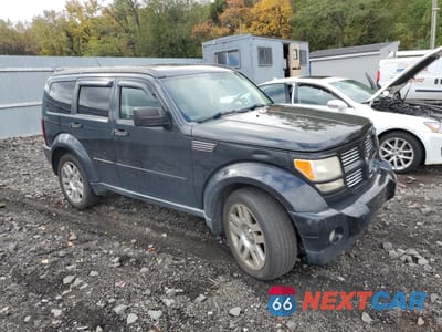 Czwarte zdjęcie samochodu z boku: 2010 DODGE NITRO SXT VIN:1D4PU5GX6AW107509 - miniatura