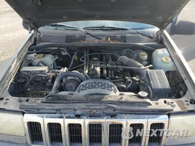 Zdjęcie 12 z 13 samochodu: 1997 JEEP GRAND CHEROKEE LAREDO VIN:1J4GZ58S9VC673117 - miniatura