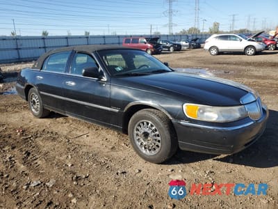 Czwarte zdjęcie samochodu z boku: 1999 LINCOLN TOWN CAR SIGNATURE VIN:1LNHM82W8XY714666 - miniatura
