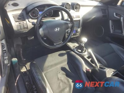 Zdjęcie 8 z 12 samochodu: 2008 HYUNDAI TIBURON GT VIN:KMHHN66F48U267273 - miniatura