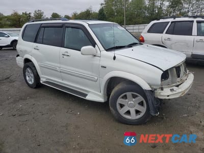Czwarte zdjęcie samochodu z boku: 2002 SUZUKI XL7 PLUS VIN:JS3TX92V924123217 - miniatura