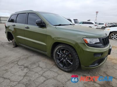 Czwarte zdjęcie samochodu z boku: 2014 JEEP GRAND CHEROKEE SUMMIT VIN:1C4RJFJTXEC275798 - miniatura