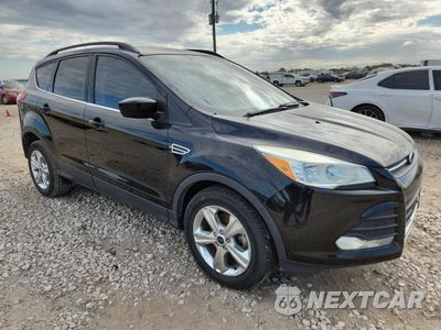 Czwarte zdjęcie samochodu z boku: 2016 FORD ESCAPE SE VIN:1FMCU0GX4GUC25606 - miniatura