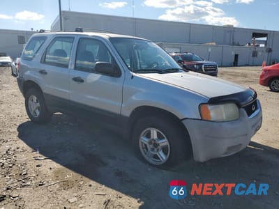 Czwarte zdjęcie samochodu z boku: 2003 FORD ESCAPE XLS VIN:1FMYU92143KA00833 - miniatura