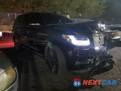 Czwarte zdjęcie samochodu z boku: 2019 LINCOLN NAVIGATOR RESERVE VIN:5LMJJ2LT8KEL17316 - miniatura