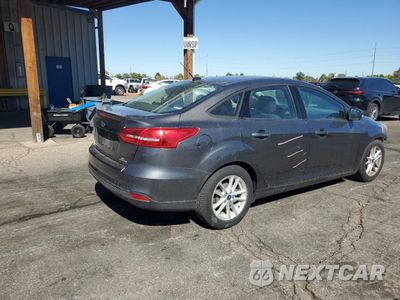 Trzecie zdjęcie samochodu z tyłu: 2015 FORD FOCUS SE VIN:1FADP3F20FL374743 - miniatura