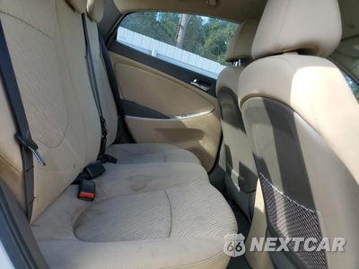 Zdjęcie 10 z 12 samochodu: 2014 HYUNDAI ACCENT GLS VIN:KMHCU4AE5EU766787 - miniatura