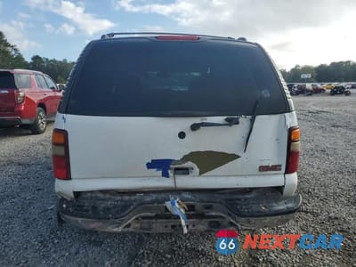 Zdjęcie 6 z 13 samochodu: 2003 GMC YUKON VIN:1GKEC13Z03R143547 - miniatura