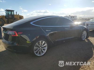 Trzecie zdjęcie samochodu z tyłu: 2019 TESLA MODEL 3 VIN:5YJ3E1EBXKF365336 - miniatura