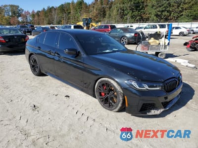 Czwarte zdjęcie samochodu z boku: 2022 BMW M550XI VIN:WBA13BK0XNCJ43688 - miniatura