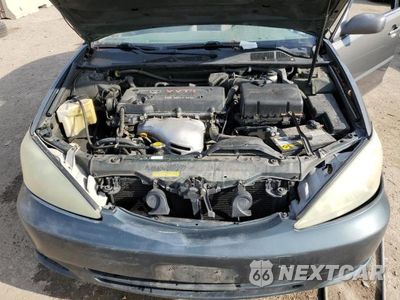 Zdjęcie 11 z 11 samochodu: 2004 TOYOTA CAMRY LE VIN:4T1BE32K24U351285 - miniatura